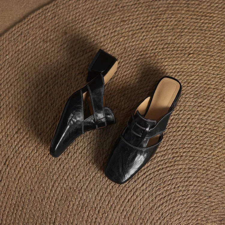 Ingrid | Mules in vera pelle con tagli laterali