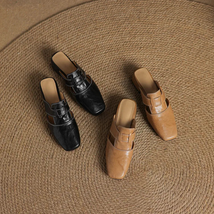 Ingrid | Mules in vera pelle con tagli laterali