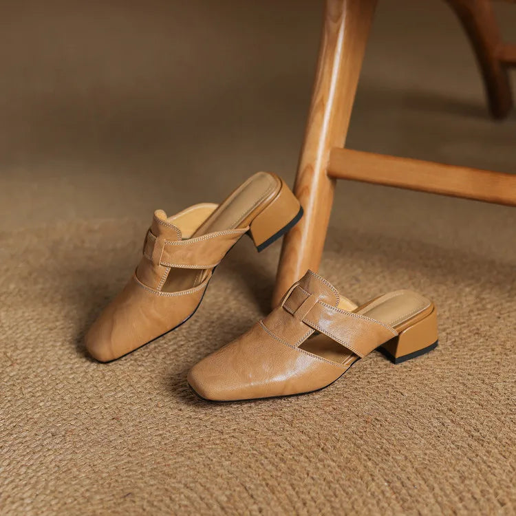 Ingrid | Mules in vera pelle con tagli laterali