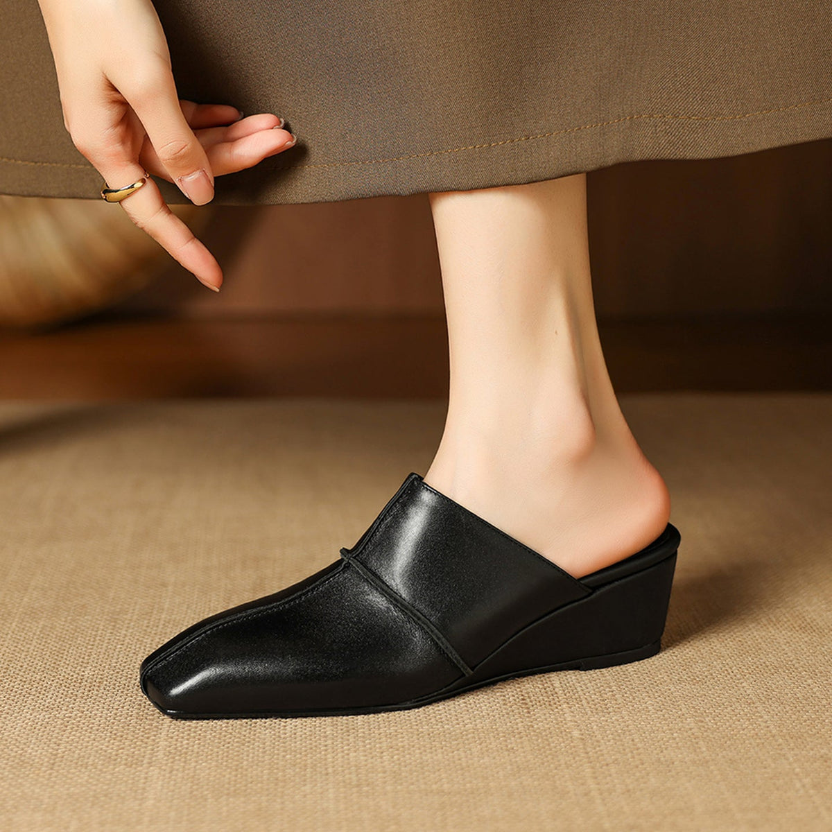 Halia | Mules in vera pelle con zeppa