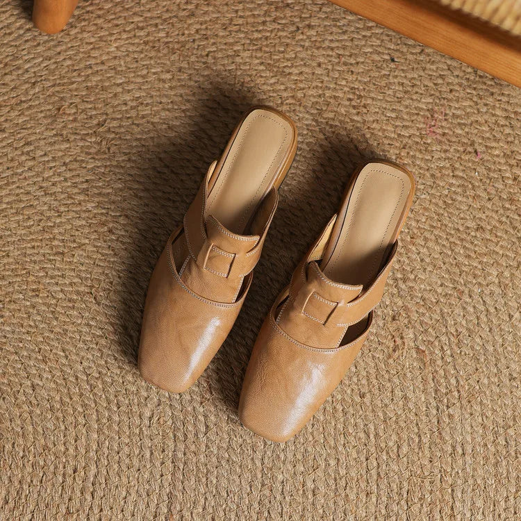 Ingrid | Mules in vera pelle con tagli laterali