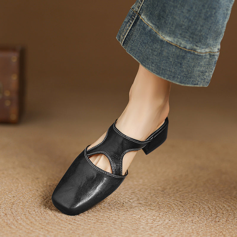 Darea | Mules in vera pelle con tagli laterali