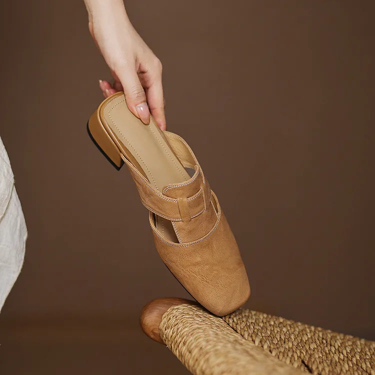 Ingrid | Mules in vera pelle con tagli laterali