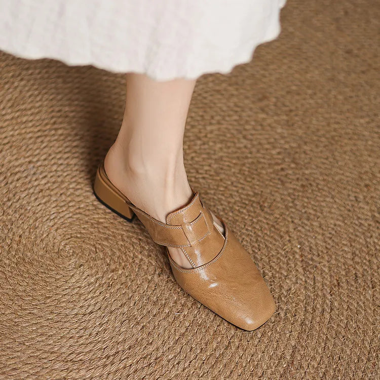 Ingrid | Mules in vera pelle con tagli laterali