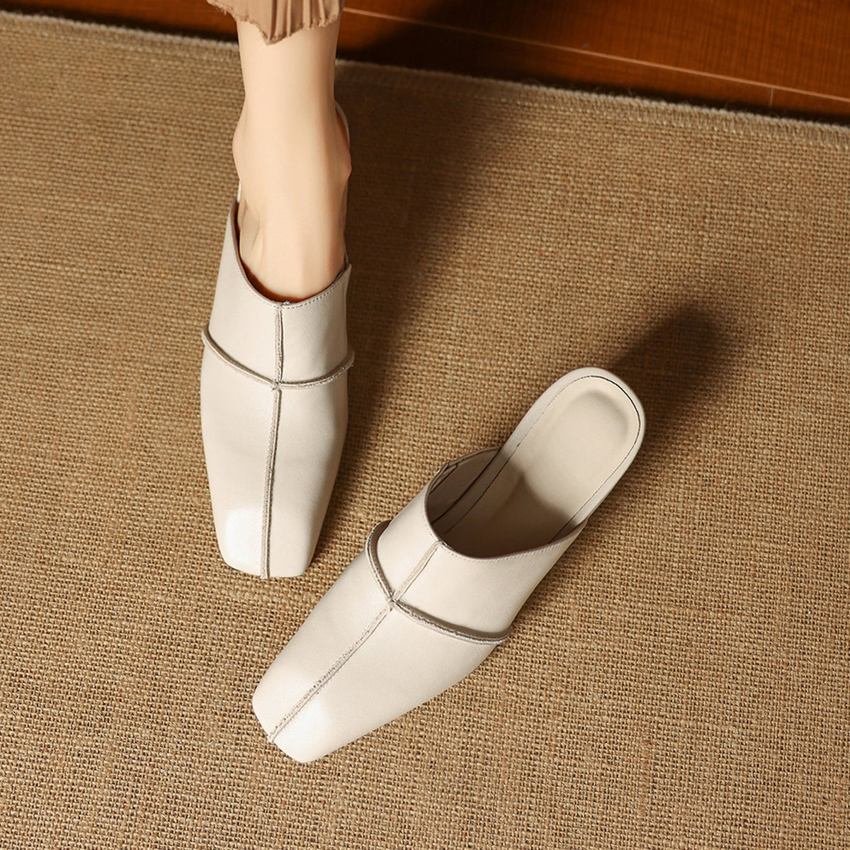 Halia | Mules in vera pelle con zeppa