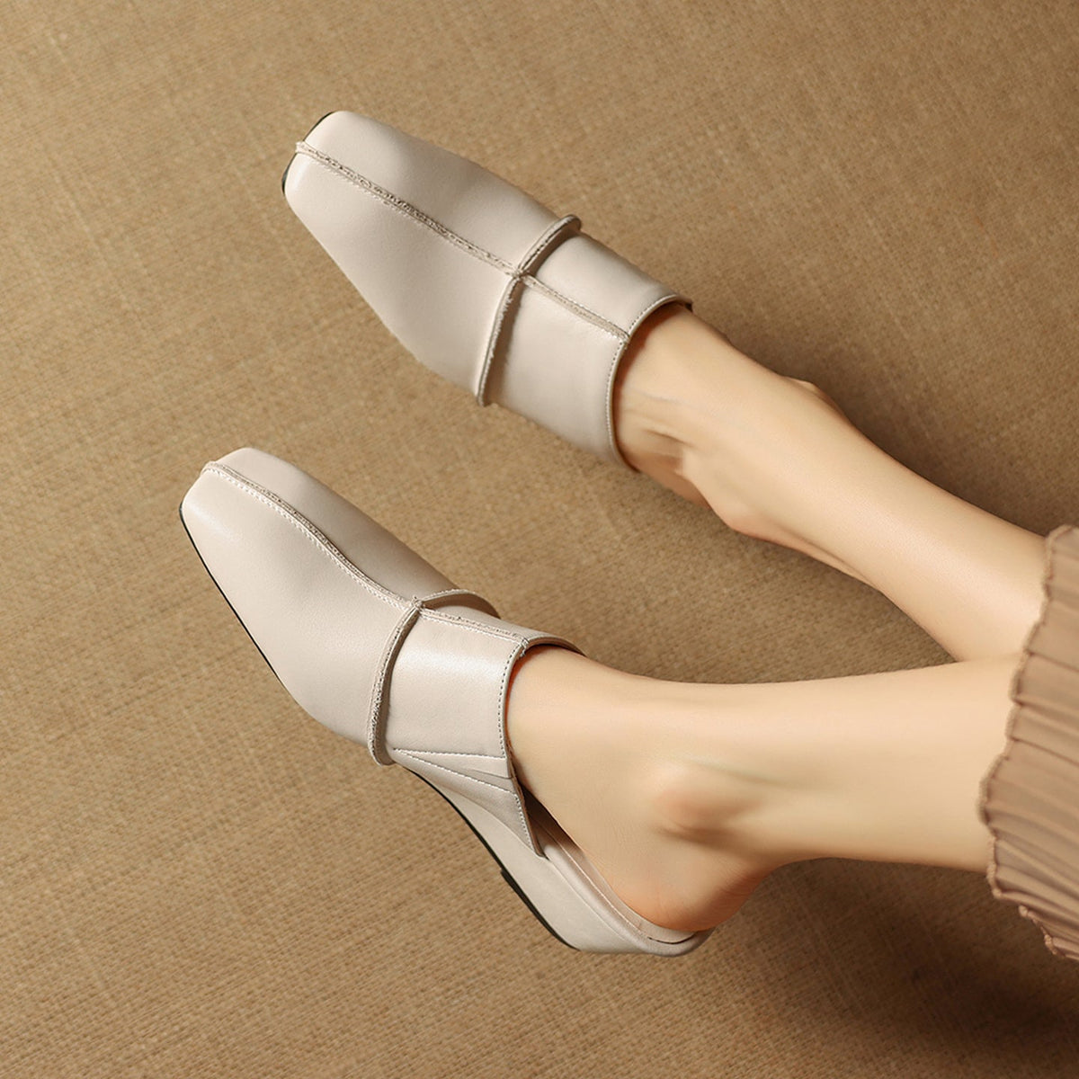 Halia | Mules in vera pelle con zeppa