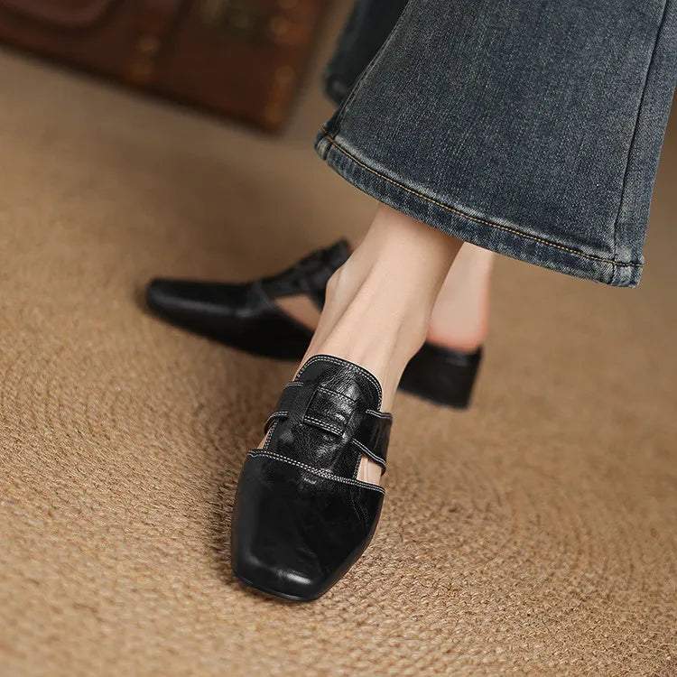 Ingrid | Mules in vera pelle con tagli laterali