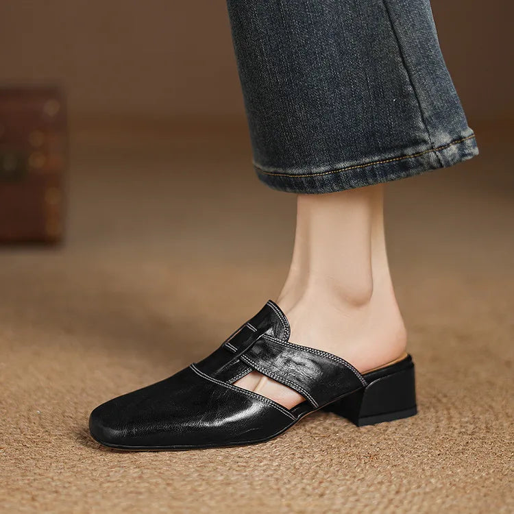 Ingrid | Mules in vera pelle con tagli laterali