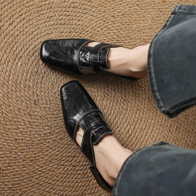 Ingrid | Mules in vera pelle con tagli laterali