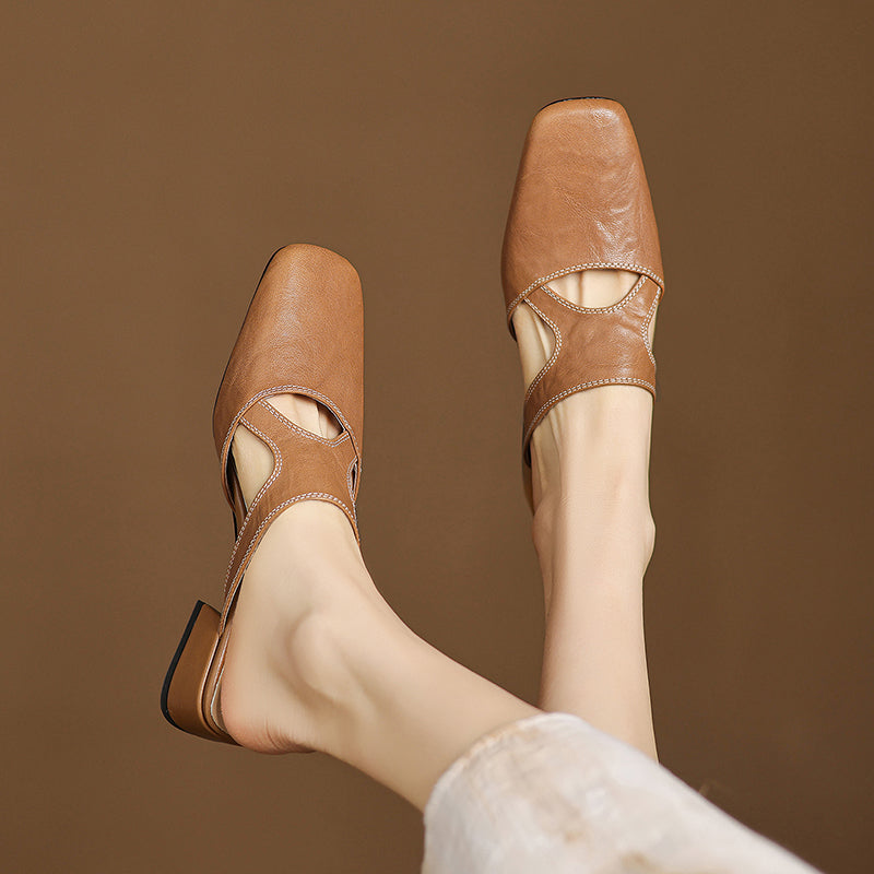 Darea | Mules in vera pelle con tagli laterali