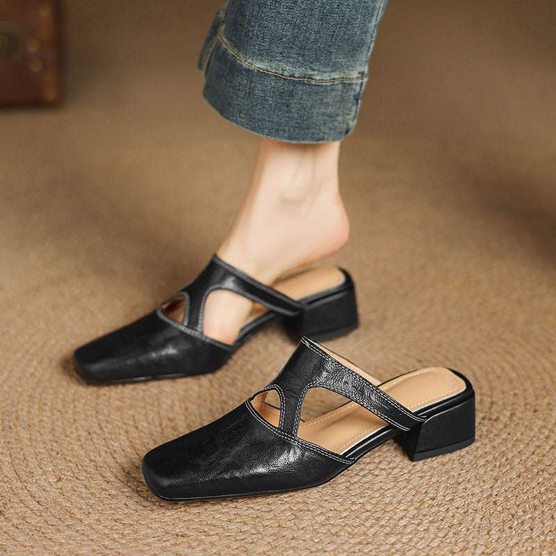 Darea | Mules in vera pelle con tagli laterali
