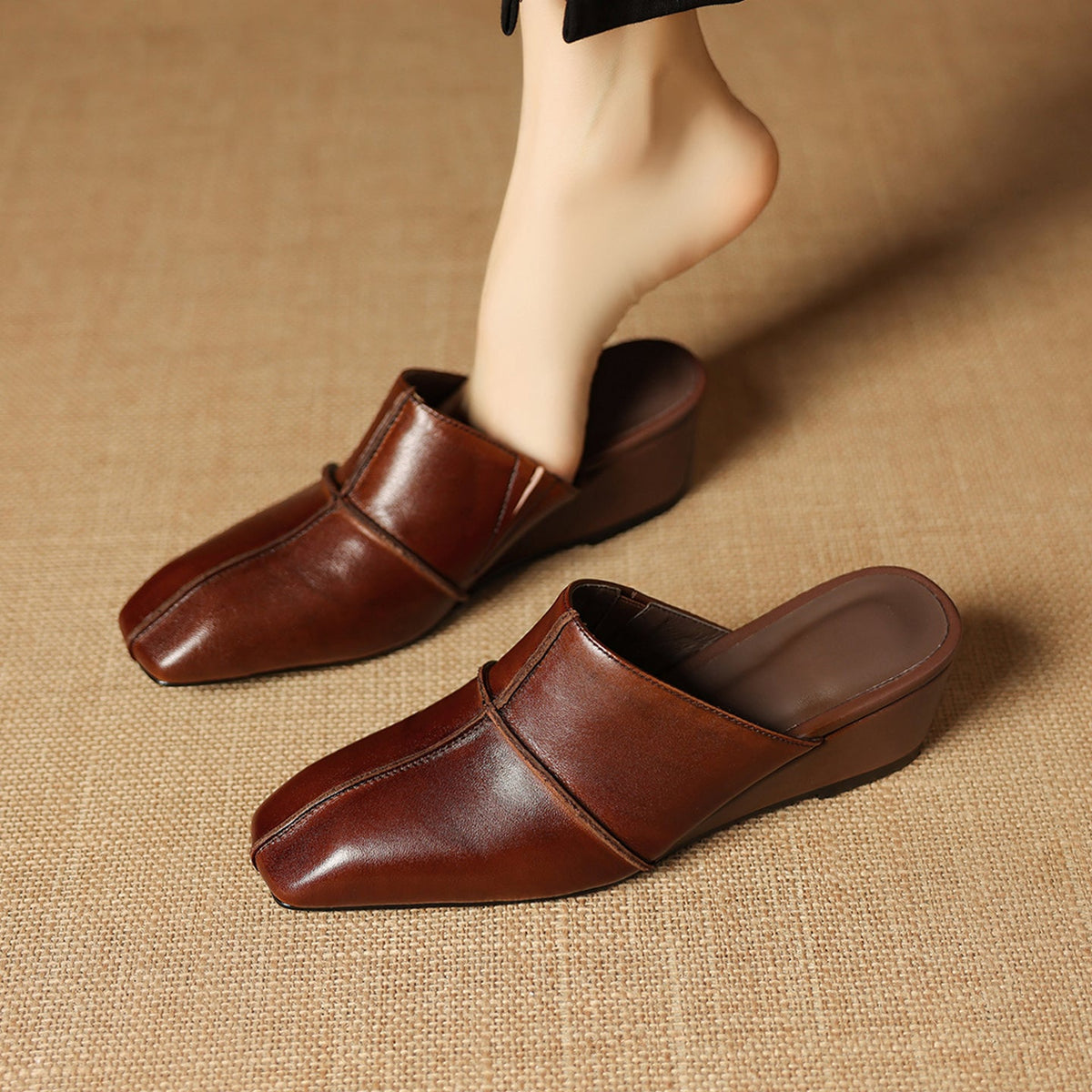 Halia | Mules in vera pelle con zeppa