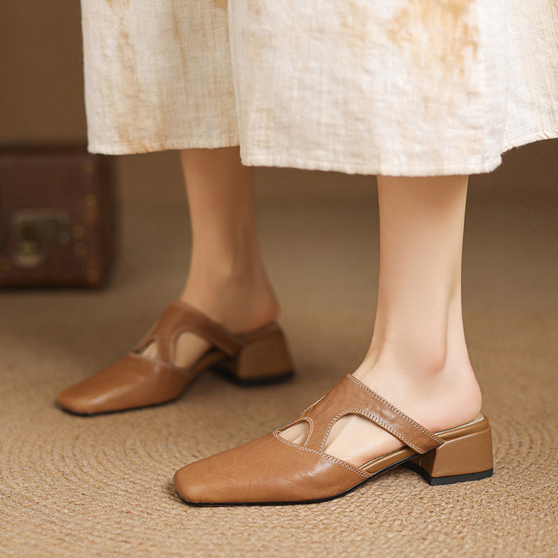 Darea | Mules in vera pelle con tagli laterali