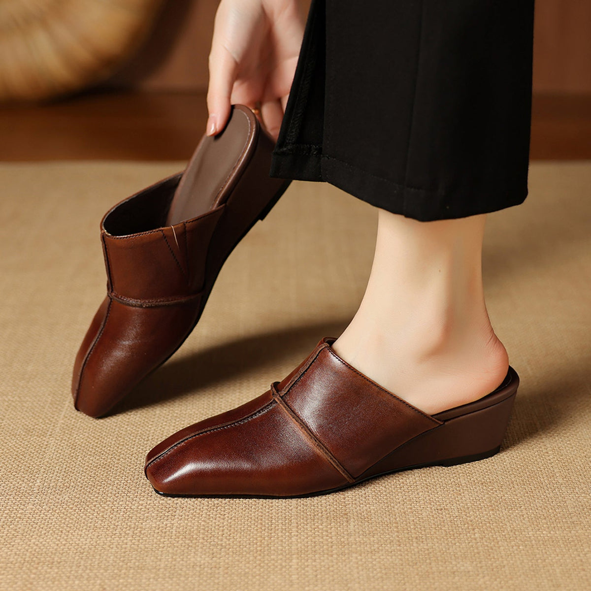 Halia | Mules in vera pelle con zeppa