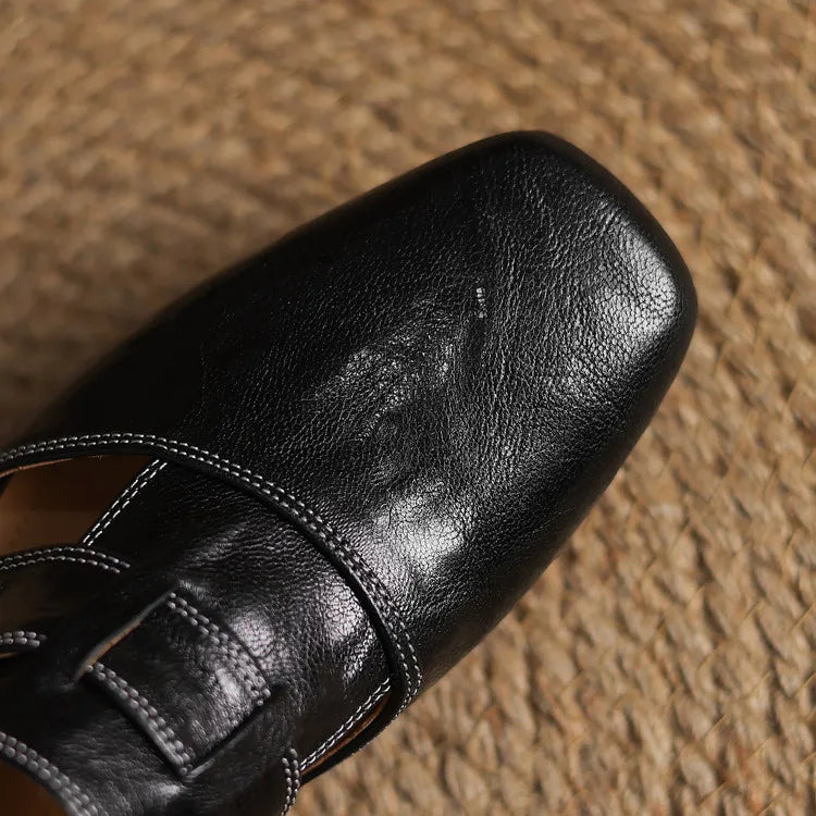 Ingrid | Mules in vera pelle con tagli laterali