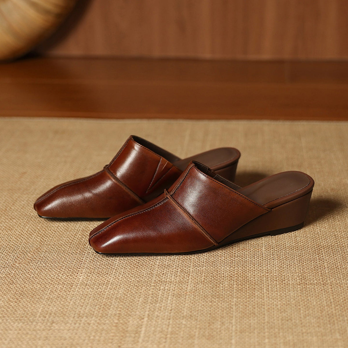 Halia | Mules in vera pelle con zeppa