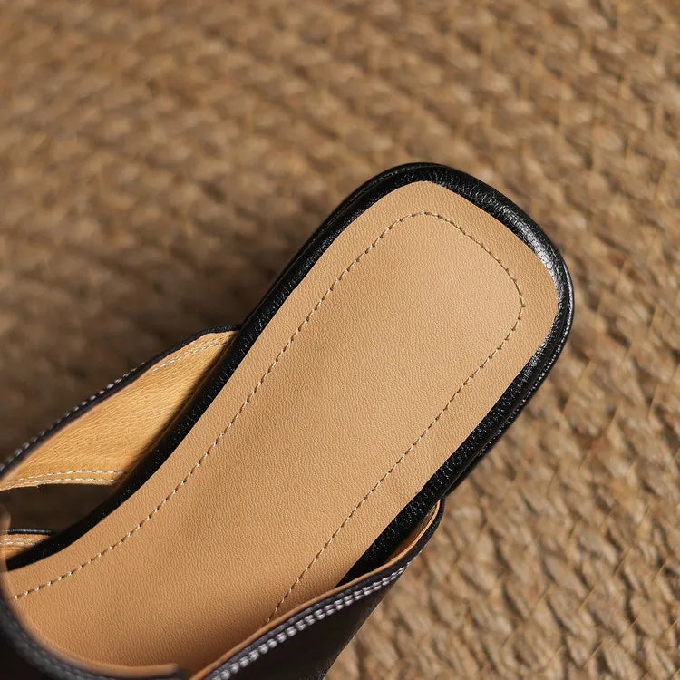 Ingrid | Mules in vera pelle con tagli laterali