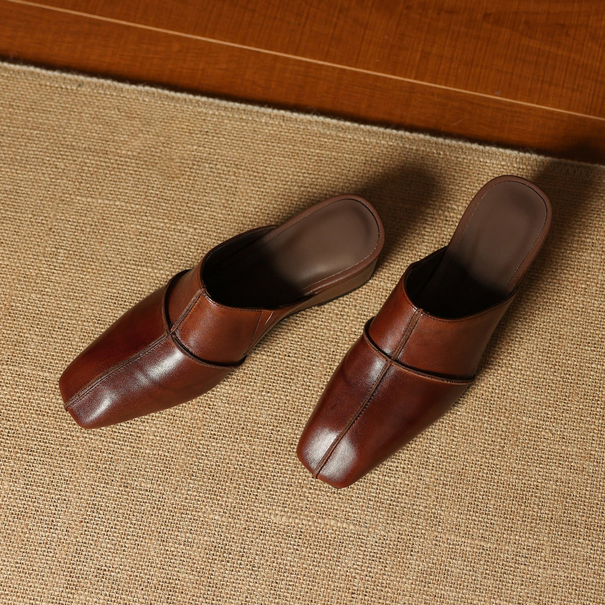 Halia | Mules in vera pelle con zeppa