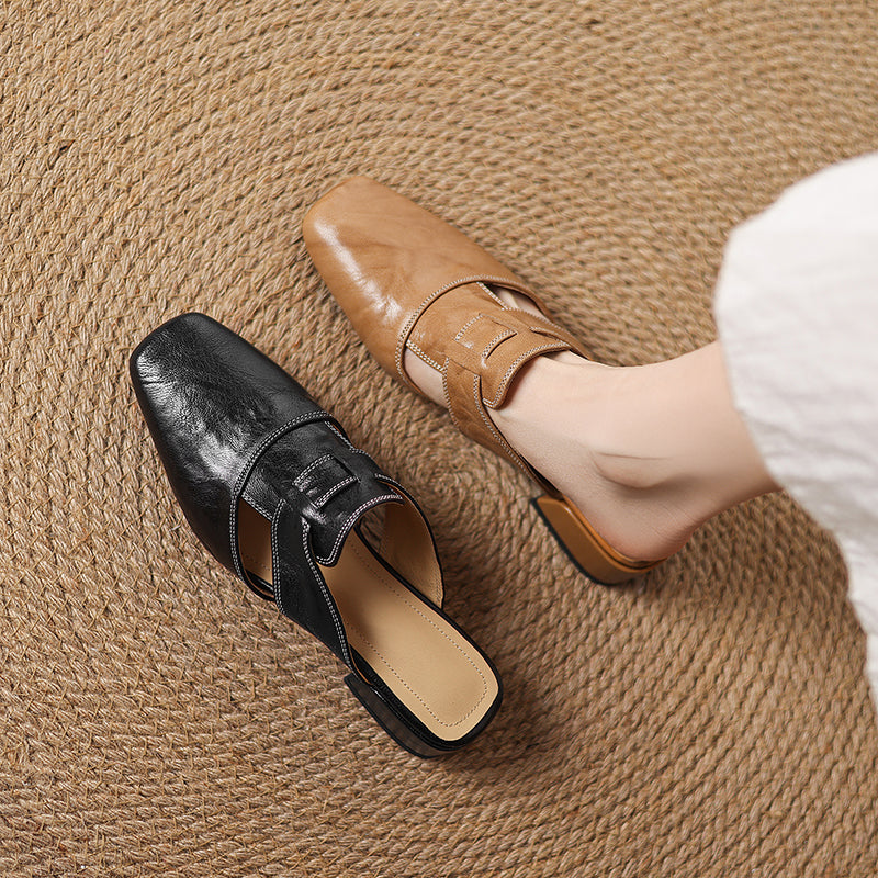 Ingrid | Mules in vera pelle con tagli laterali