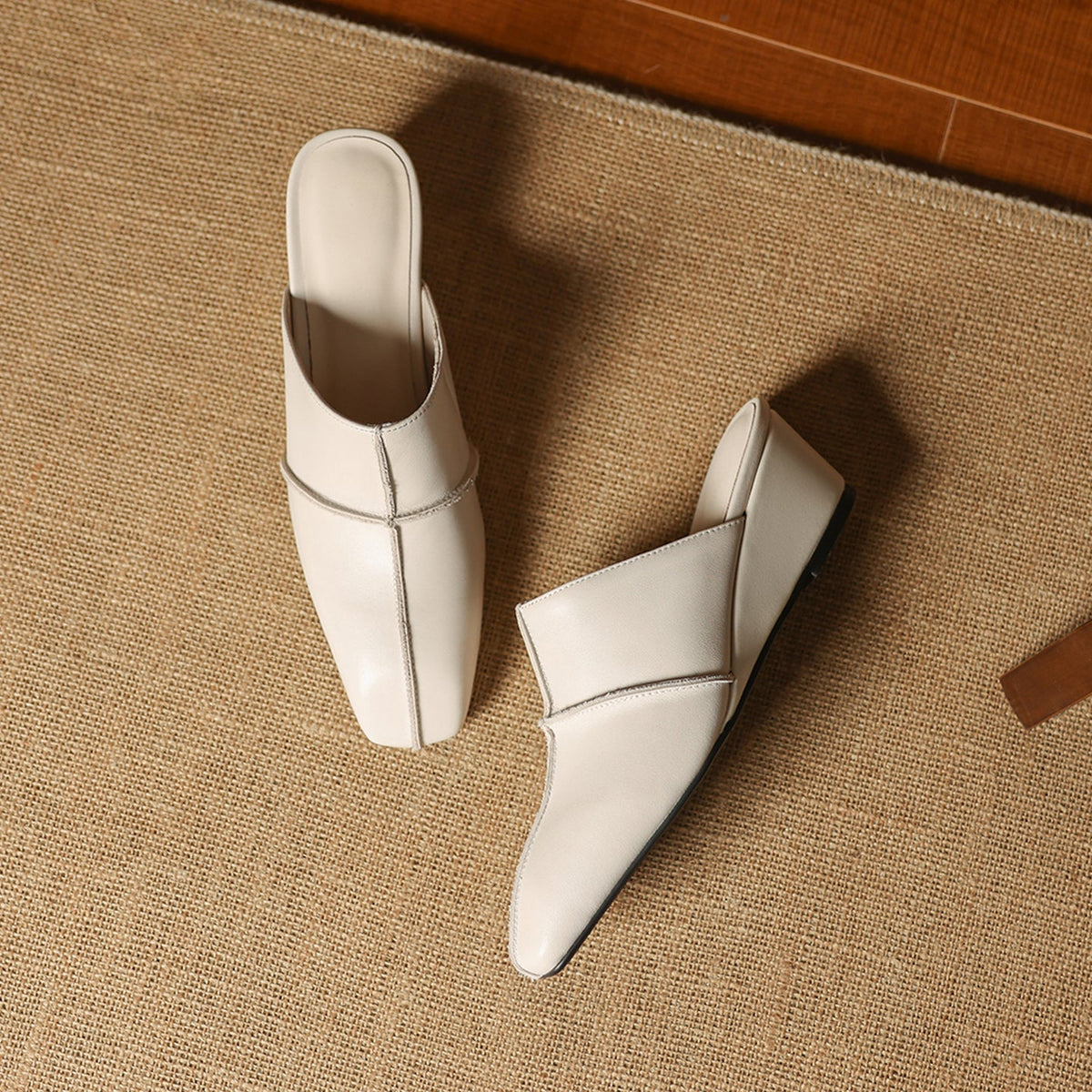 Halia | Mules in vera pelle con zeppa