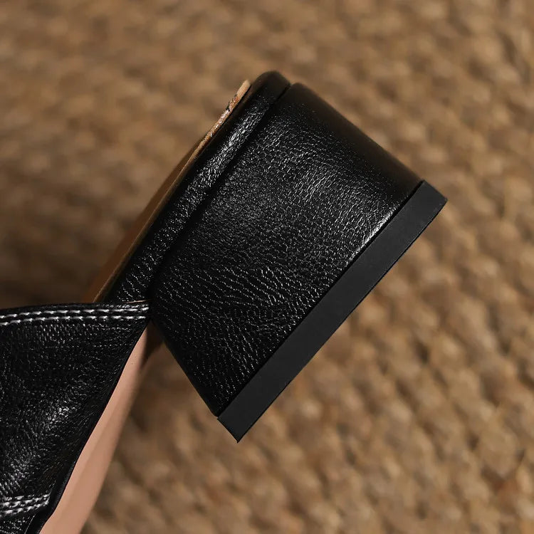 Ingrid | Mules in vera pelle con tagli laterali