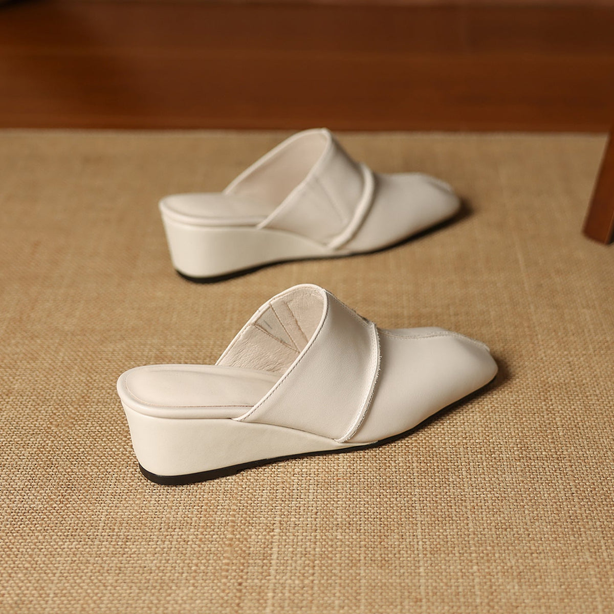 Halia | Mules in vera pelle con zeppa