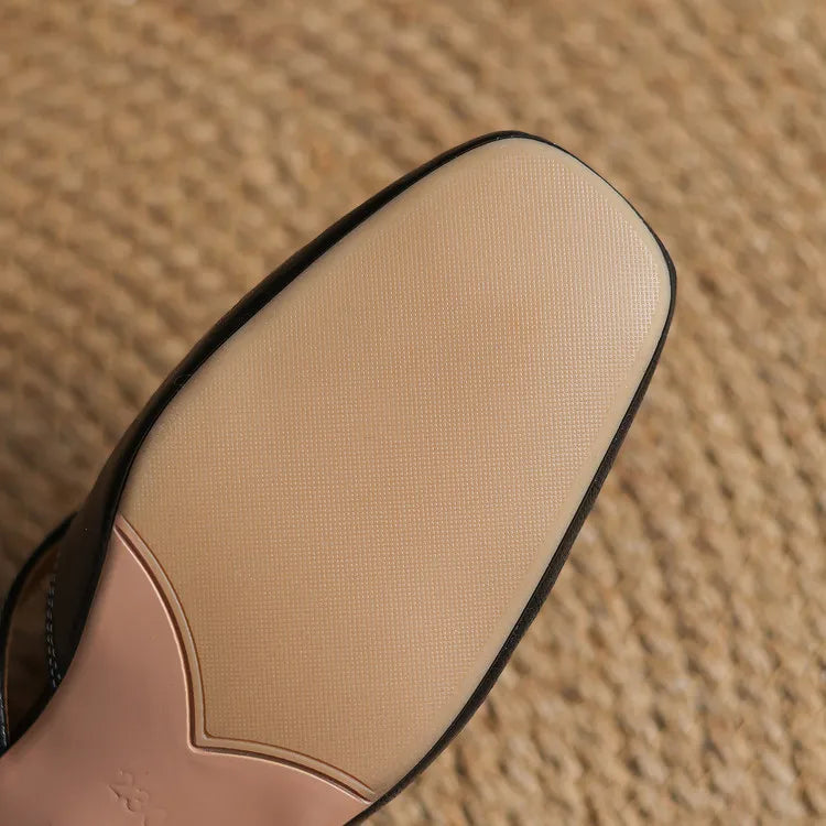 Ingrid | Mules in vera pelle con tagli laterali