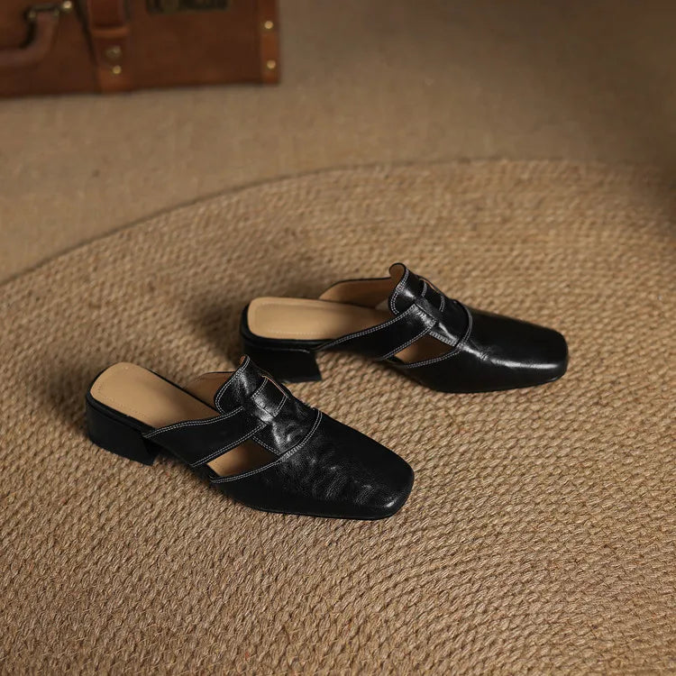 Ingrid | Mules in vera pelle con tagli laterali
