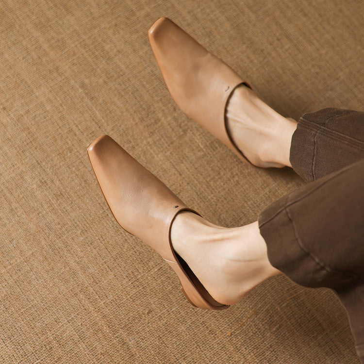 Kessa | Mules in vera pelle con zeppa