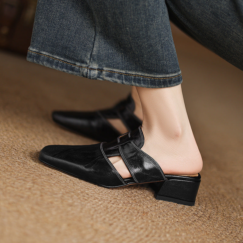 Brea | Mules in vera pelle con tagli asimmetrici