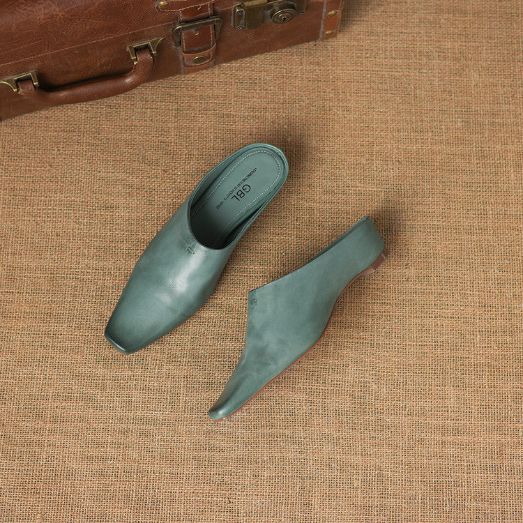 Kessa | Mules in vera pelle con zeppa