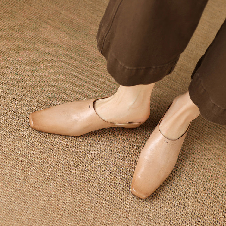 Kessa | Mules in vera pelle con zeppa