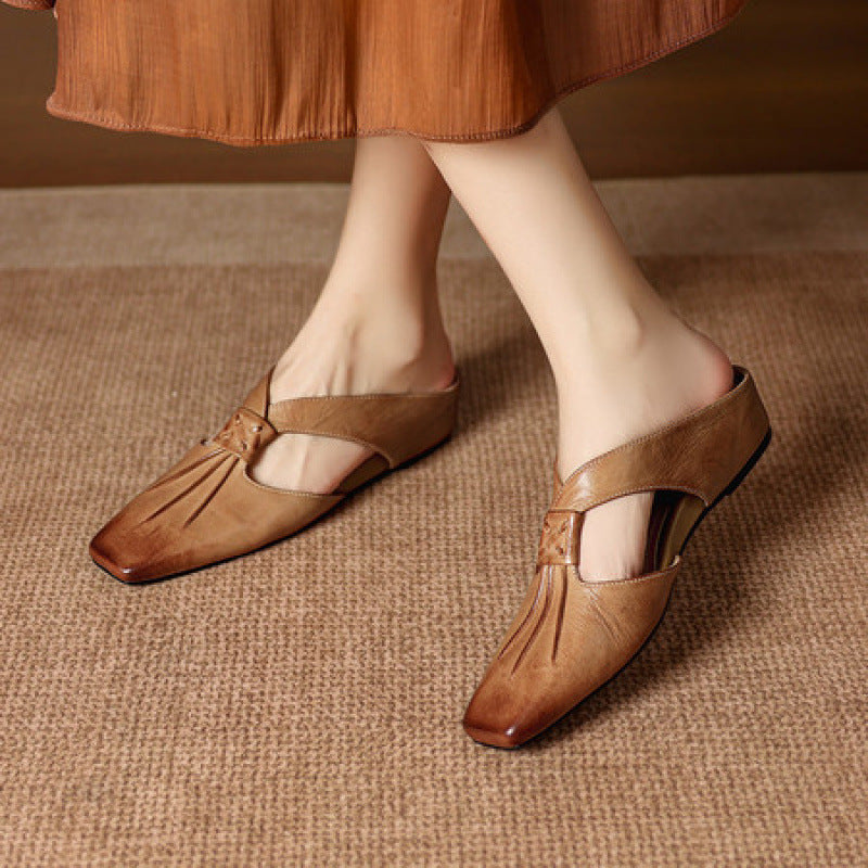 Gianna | Mules in vera pelle con fasce a X