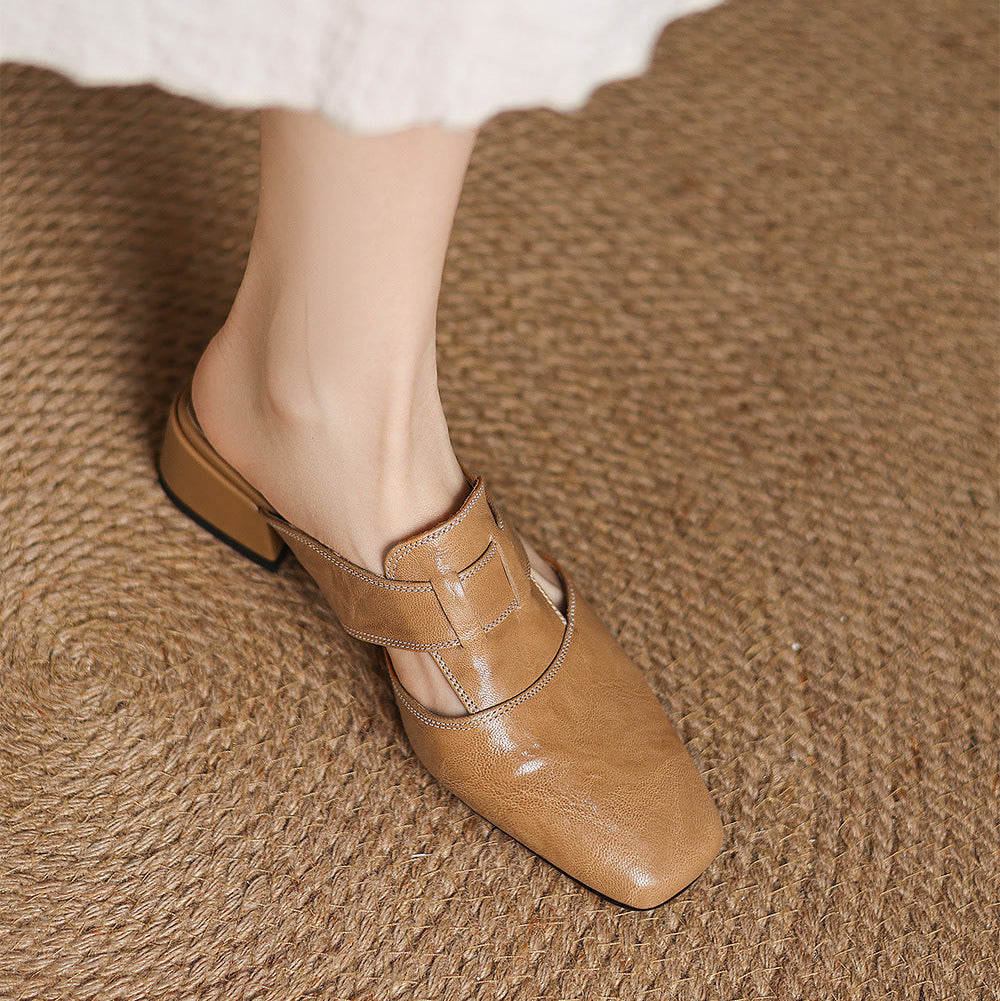 Brea | Mules in vera pelle con tagli asimmetrici