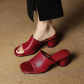 Amira | Mules in vera pelle con tacco cilindrico