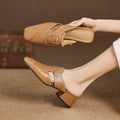 Brea | Mules in vera pelle con tagli asimmetrici