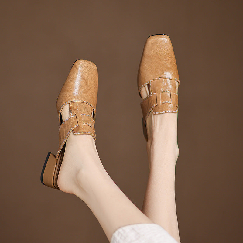 Brea | Mules in vera pelle con tagli asimmetrici