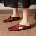 Delysa | Mules in vera pelle con fasce incrociate