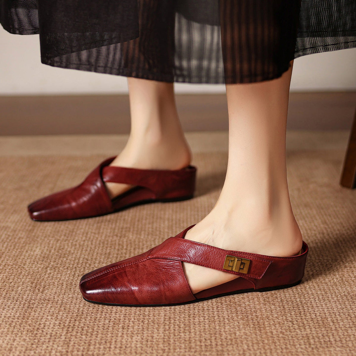 Delysa | Mules in vera pelle con fasce incrociate
