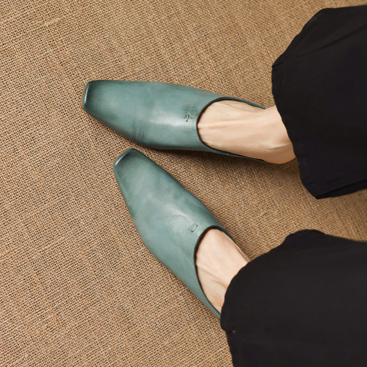 Kessa | Mules in vera pelle con zeppa