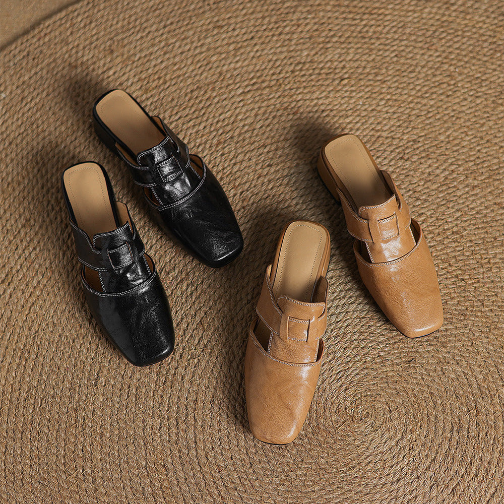 Brea | Mules in vera pelle con tagli asimmetrici