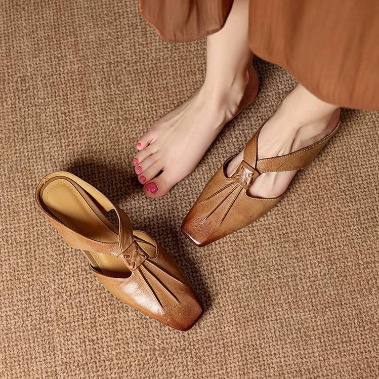 Gianna | Mules in vera pelle con fasce a X
