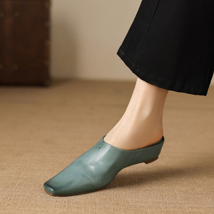 Kessa | Mules in vera pelle con zeppa