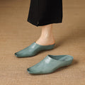 Kessa | Mules in vera pelle con zeppa