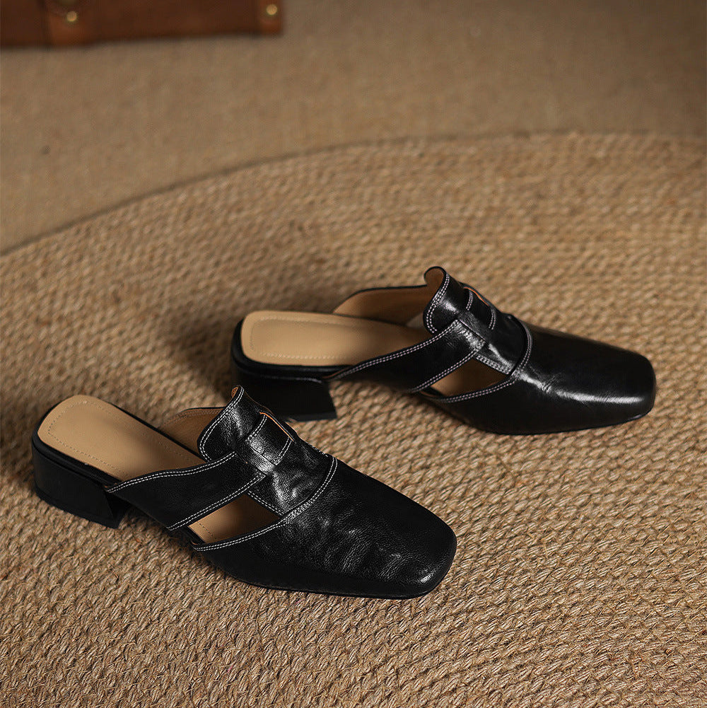 Brea | Mules in vera pelle con tagli asimmetrici