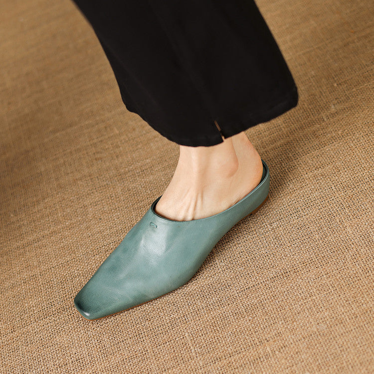 Kessa | Mules in vera pelle con zeppa