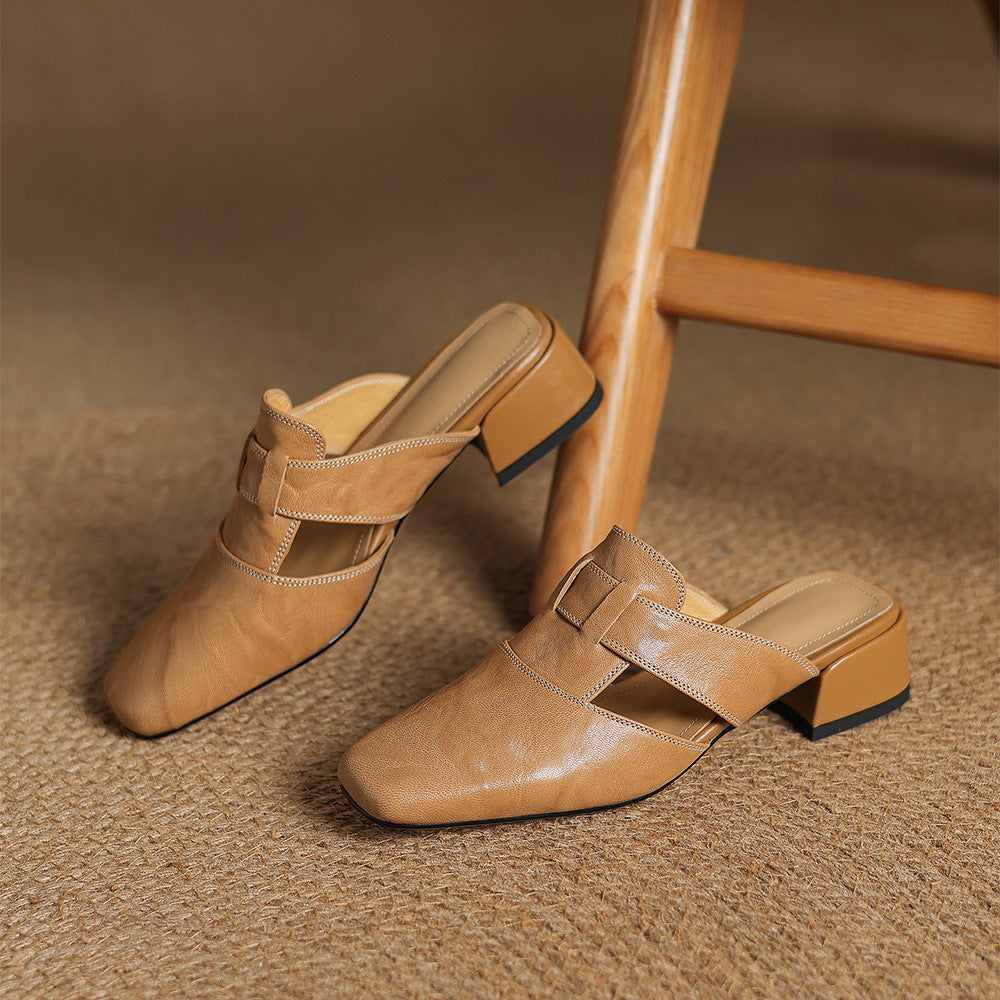 Brea | Mules in vera pelle con tagli asimmetrici
