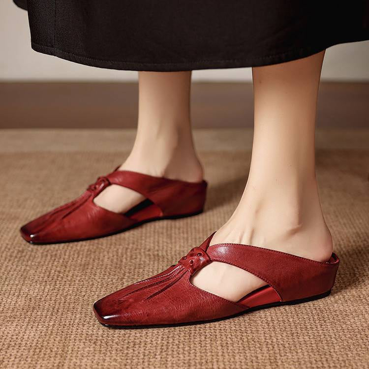 Gianna | Mules in vera pelle con fasce a X