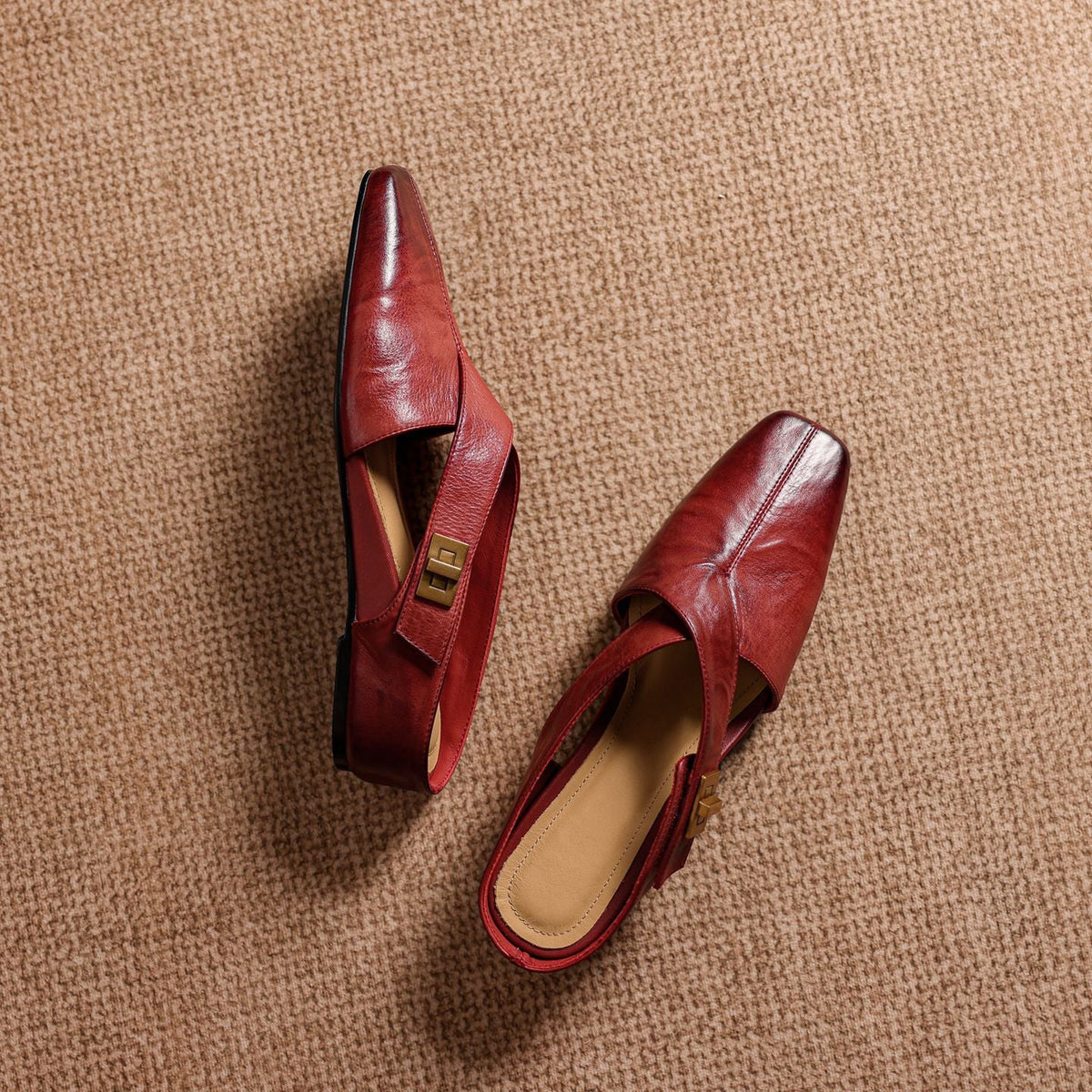 Delysa | Mules in vera pelle con fasce incrociate