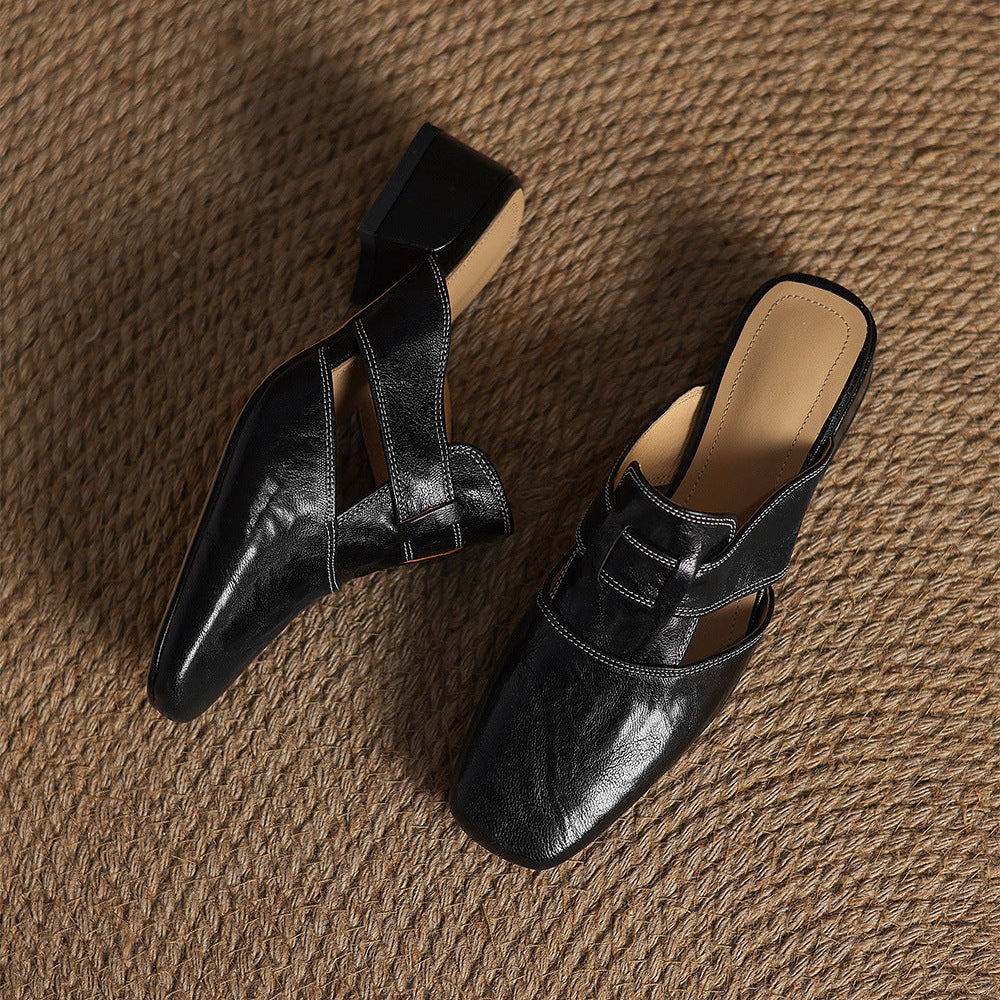Brea | Mules in vera pelle con tagli asimmetrici